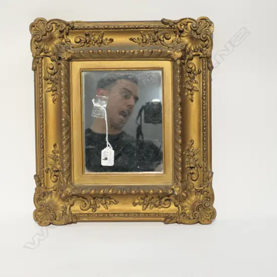SMALL GILT FRAMED MIRROR