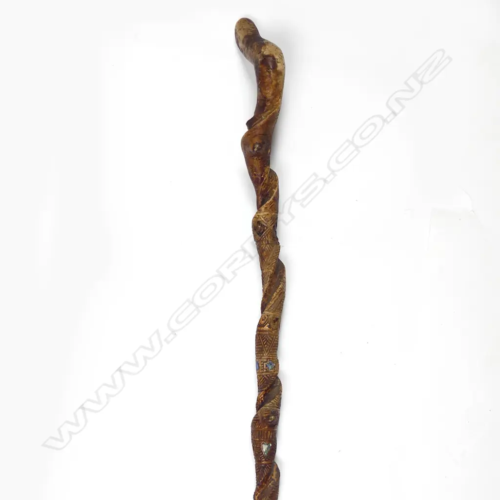 An early/mid-20thC Maori carved honey suckle vine walking stick Image 1++