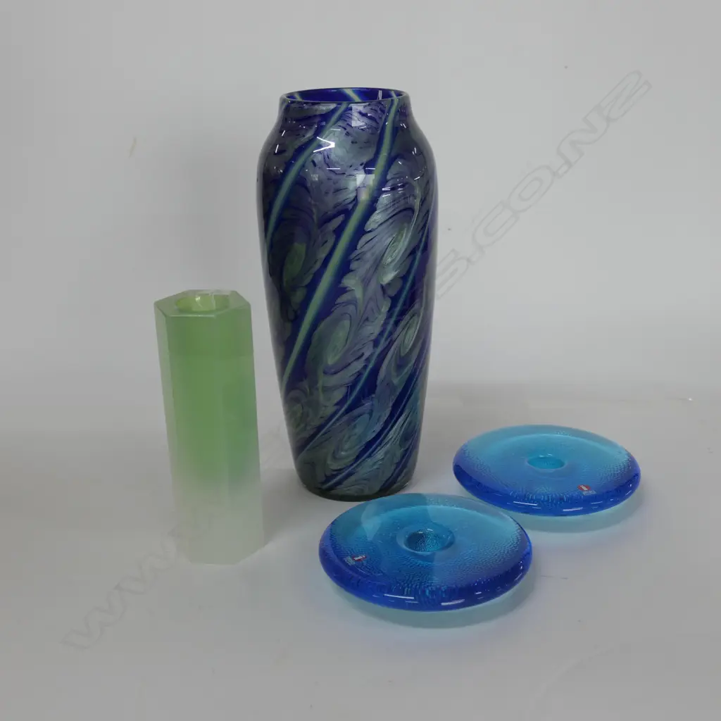 A pair of blue glass iitala votive candle holders Image 1++