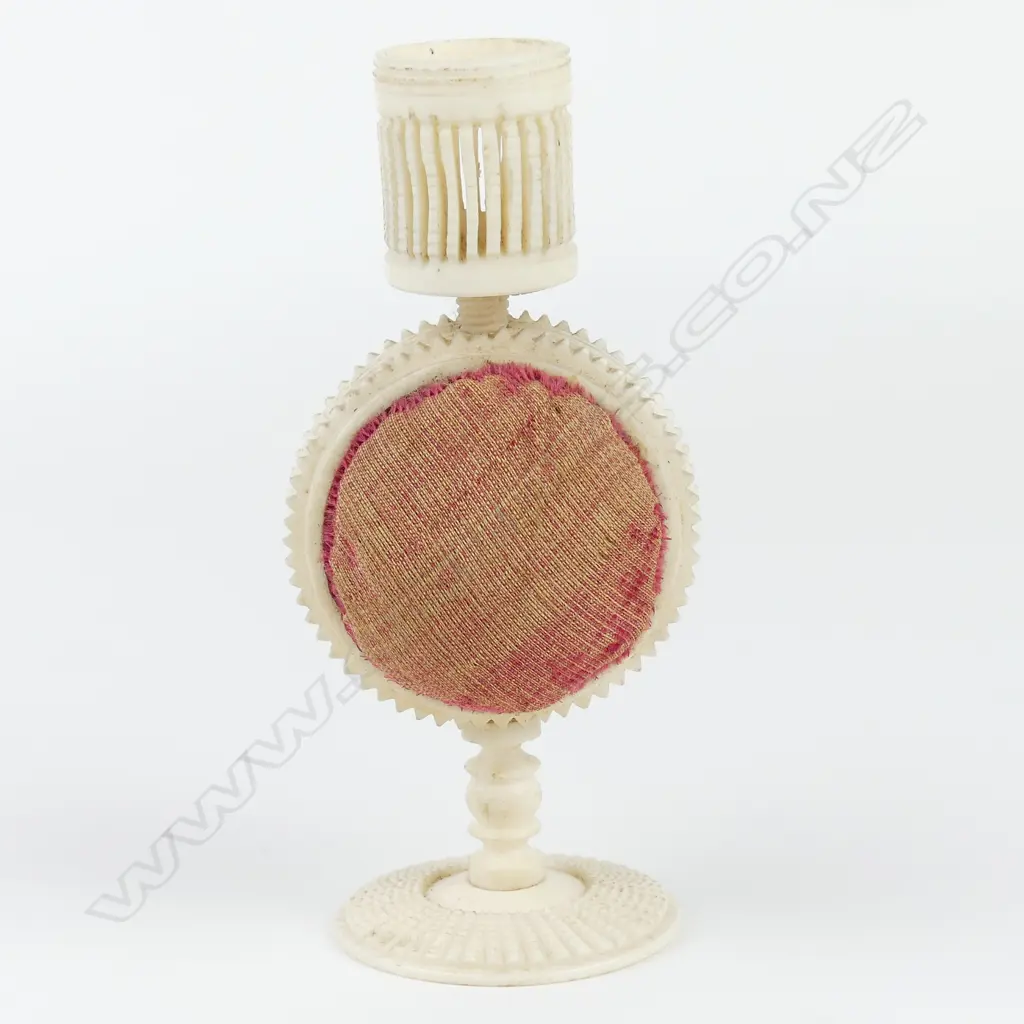 A 19thC carved and turned bone pedestal pin cushion combination thimble holder Image 1++