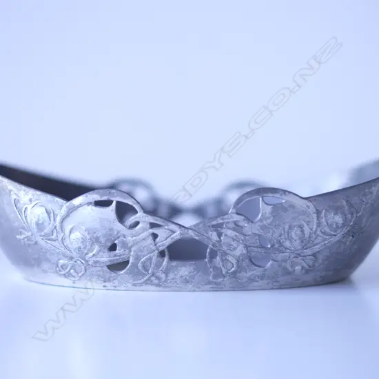 An Archibald Knox design English Pewter dish