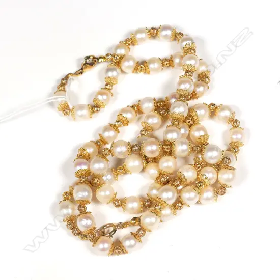 CULTURED PEARL NECKLACE/BRACELET SET WITH GILT CAPS AND BEADS