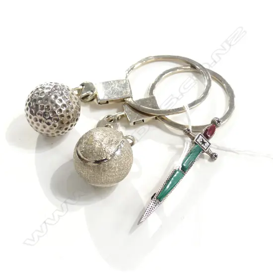 3 SILVER ITEMS: SWORD BROOCH + 2 KEYRINGS