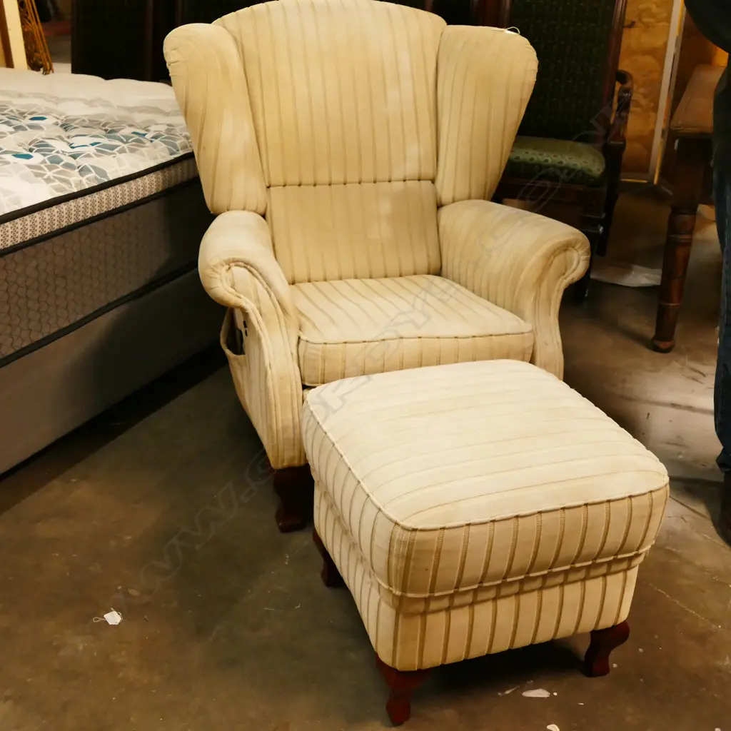 UPHOLSTERED WING BACK ARMCHAIR AND STOOL Image 1++