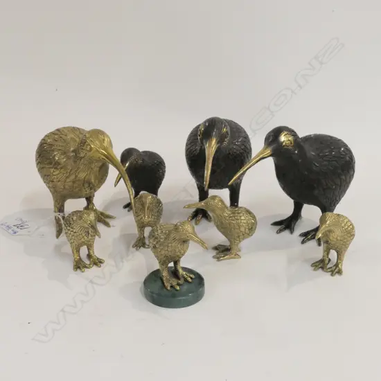 THREE LARGE BRONZE KIWIS AND SIX SMALL KIWIS
