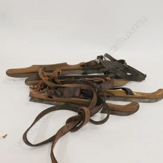 TWO PAIRS VINTAGE ICE SKATES L. 400