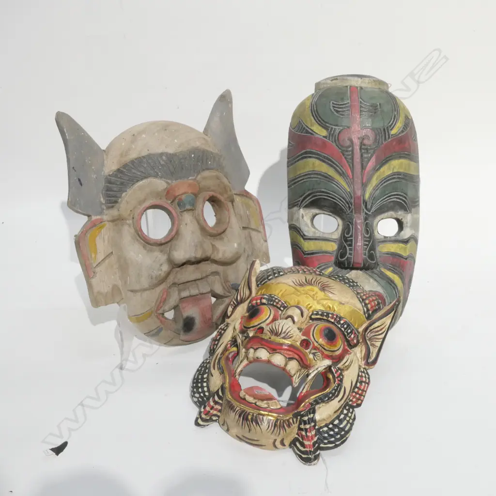 3 CARVED WOODEN MASKS Image 1++