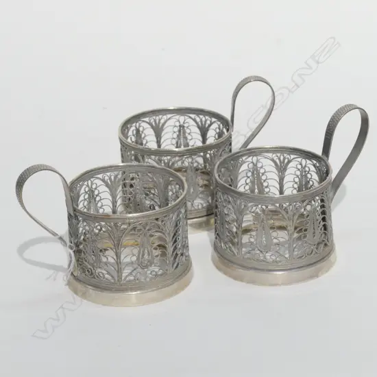 3 SILVER FILIGREE TEA CUP HOLDERS 225GMS