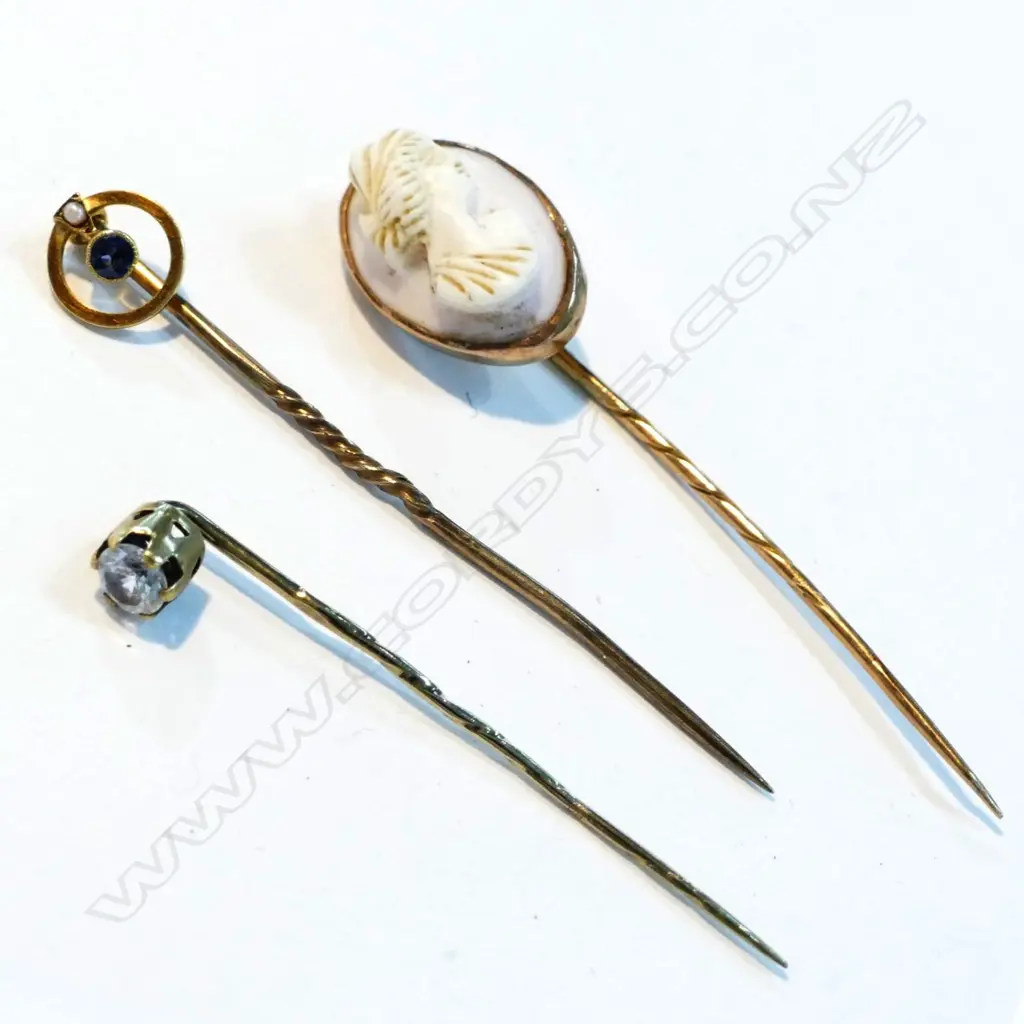 THREE 9CT GOLD STICK PINS Image 1++
