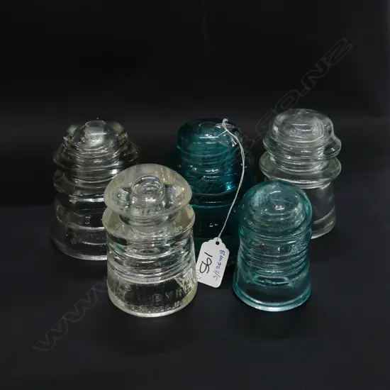 7 GREEN GLASS INSULATORS WITH 4 CLEAR H 100 MM 