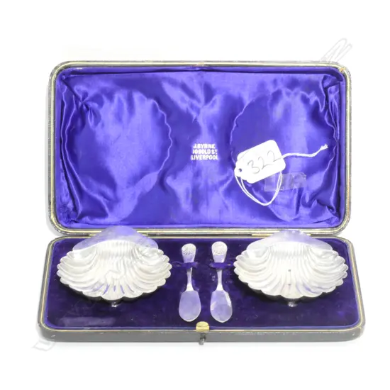 PAIR OF STG CLAMSHELLS WITH MATCHING SPOONS AND CASE