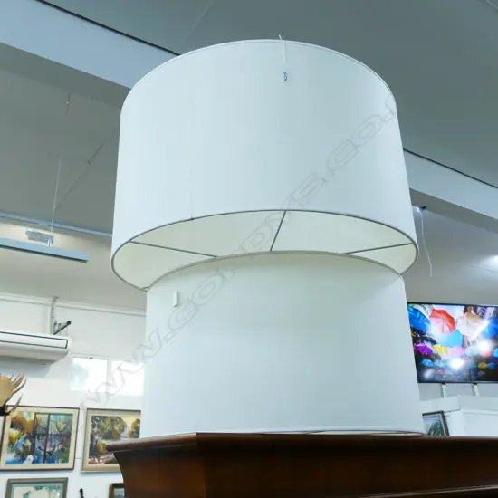 TWO LARGE CREAM PARCHMENT DRUM LAMPSHADES, W. 360MM, DIA. 670MM