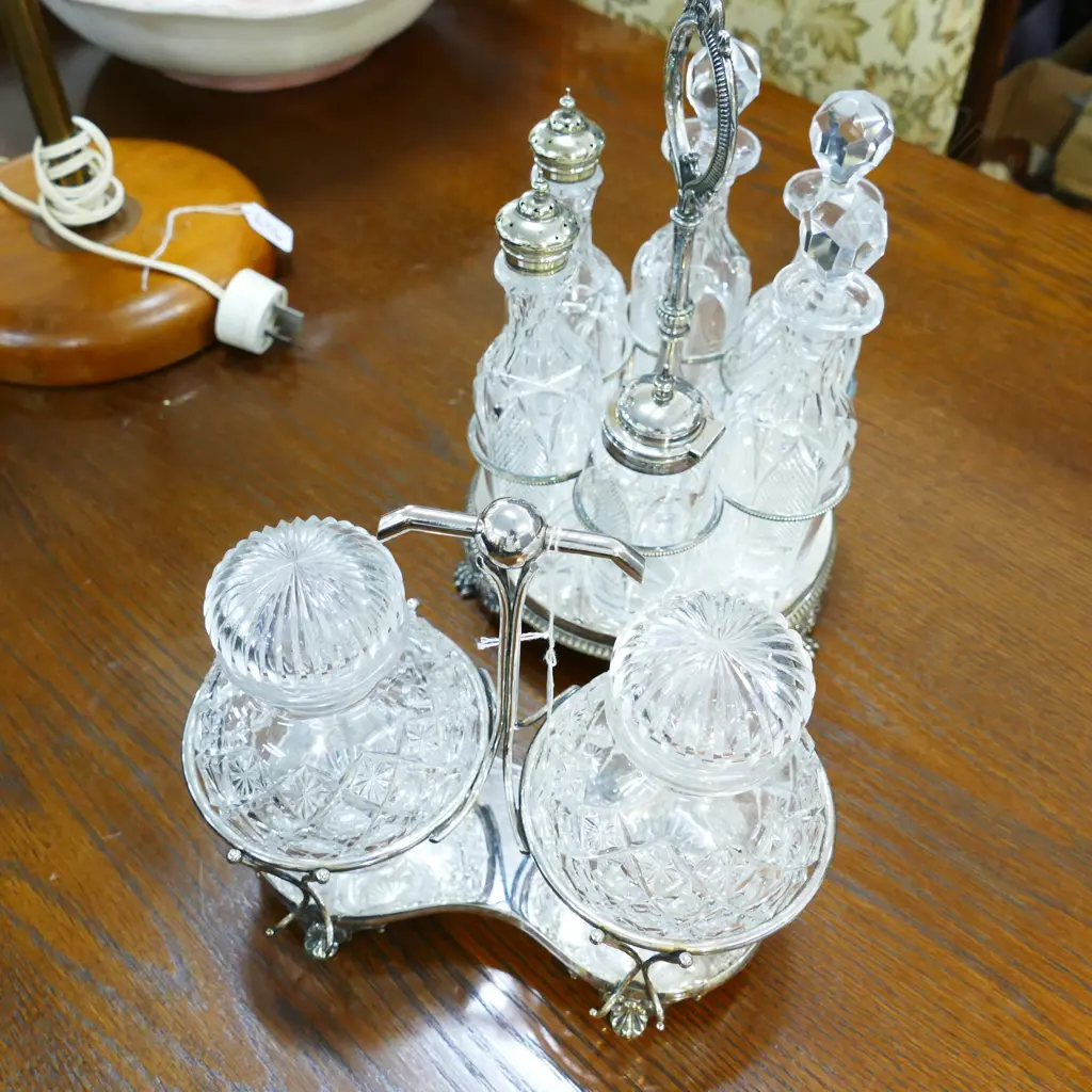 TWO CRUETS WITH GLASSWARE Image 1++