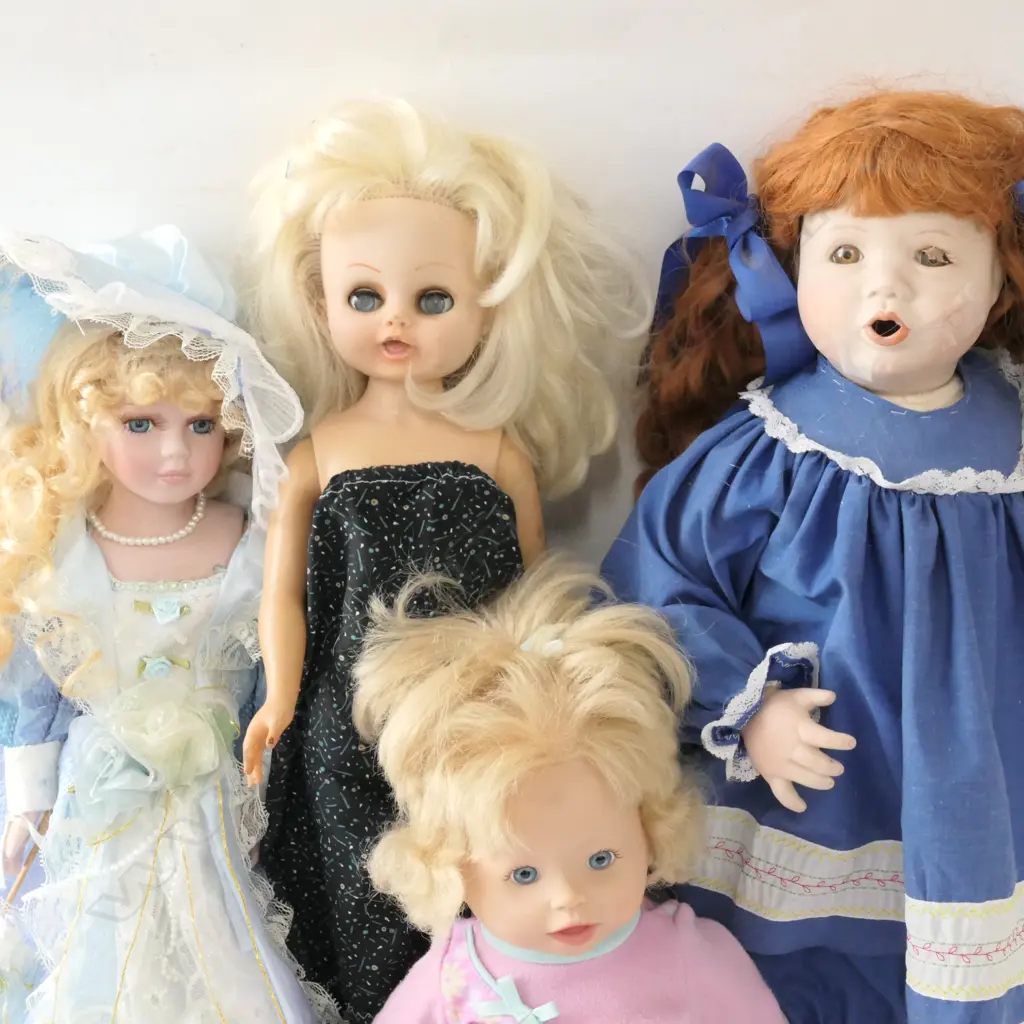 4 MODERN DOLLS PORCELAIN AND HARD RUBBER Image 1++