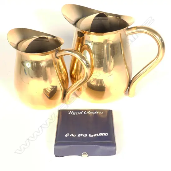 TWO AIR NZ WATER JUGS AND SET OF TRAVELLING CHECKERS