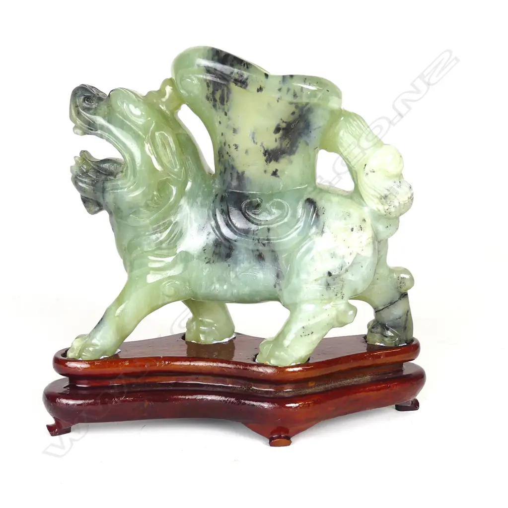 A Chinese jade lion dog libation cup Image 1++