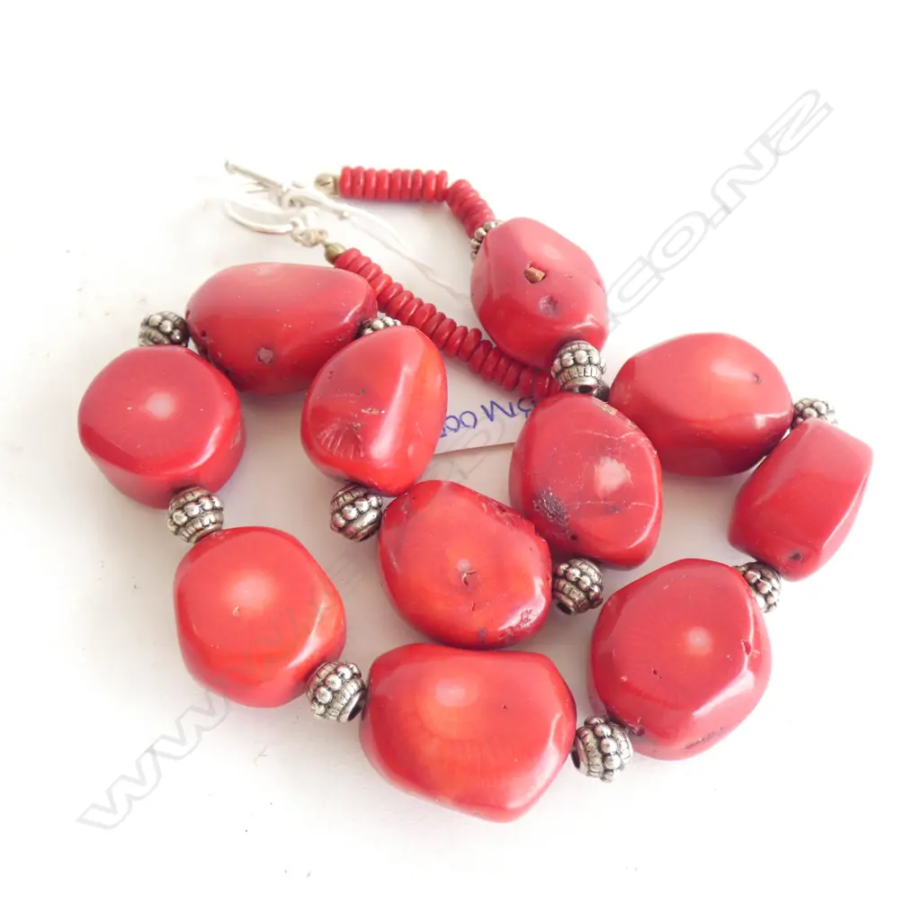 A dyed red coral and silver necklace Image 1++