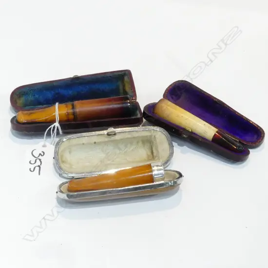 3 AMBER AND MEERSHAUM CIGAR HOLDERS IN CASES