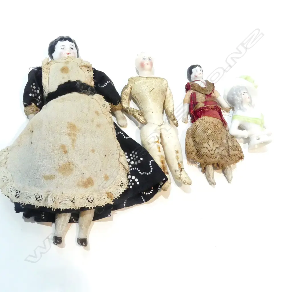 3 FROZEN CHARLOTTE DOLLS AND TWO HALF DOLLS Image 1++