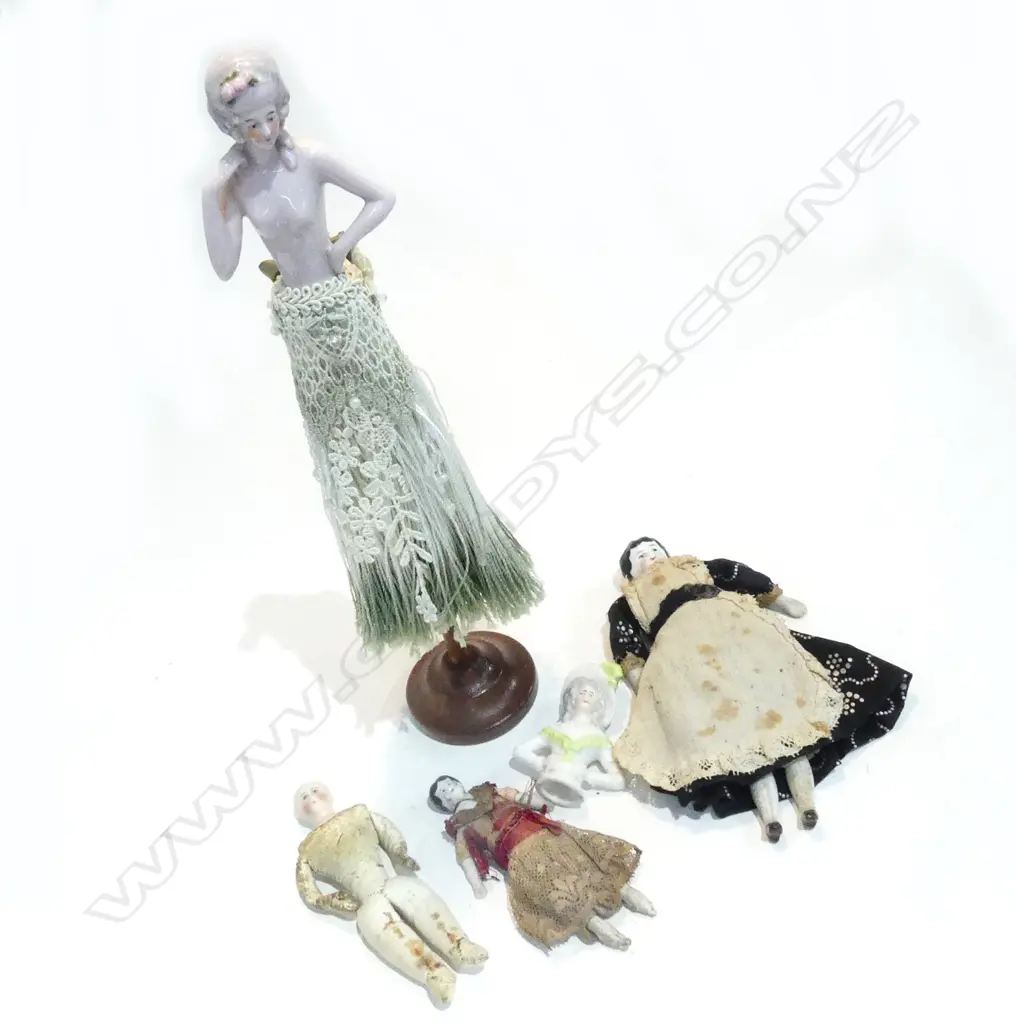 3 FROZEN CHARLOTTE DOLLS AND TWO HALF DOLLS Image 1++