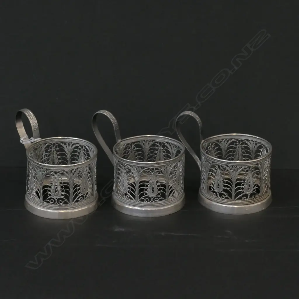 3 S/PLATE FILIGREE TEA CUP HOLDERS 225GMS Image 1++
