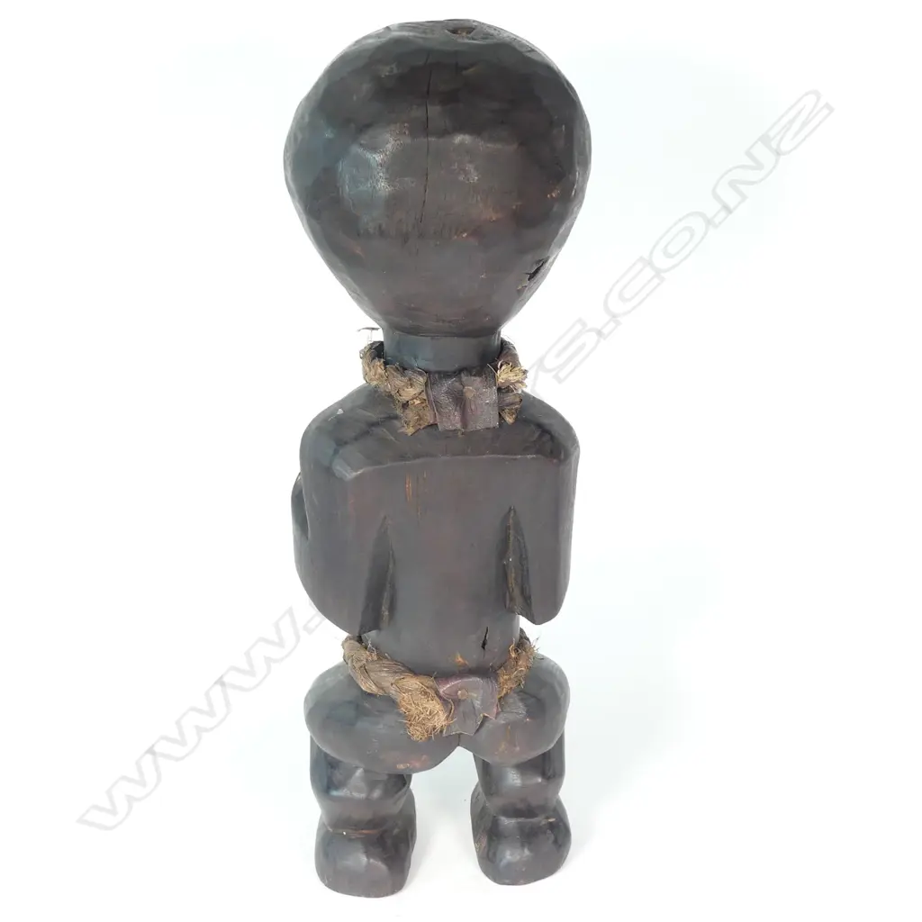 A vintage 'Dan' ancestor figure from Liberia Image 1++
