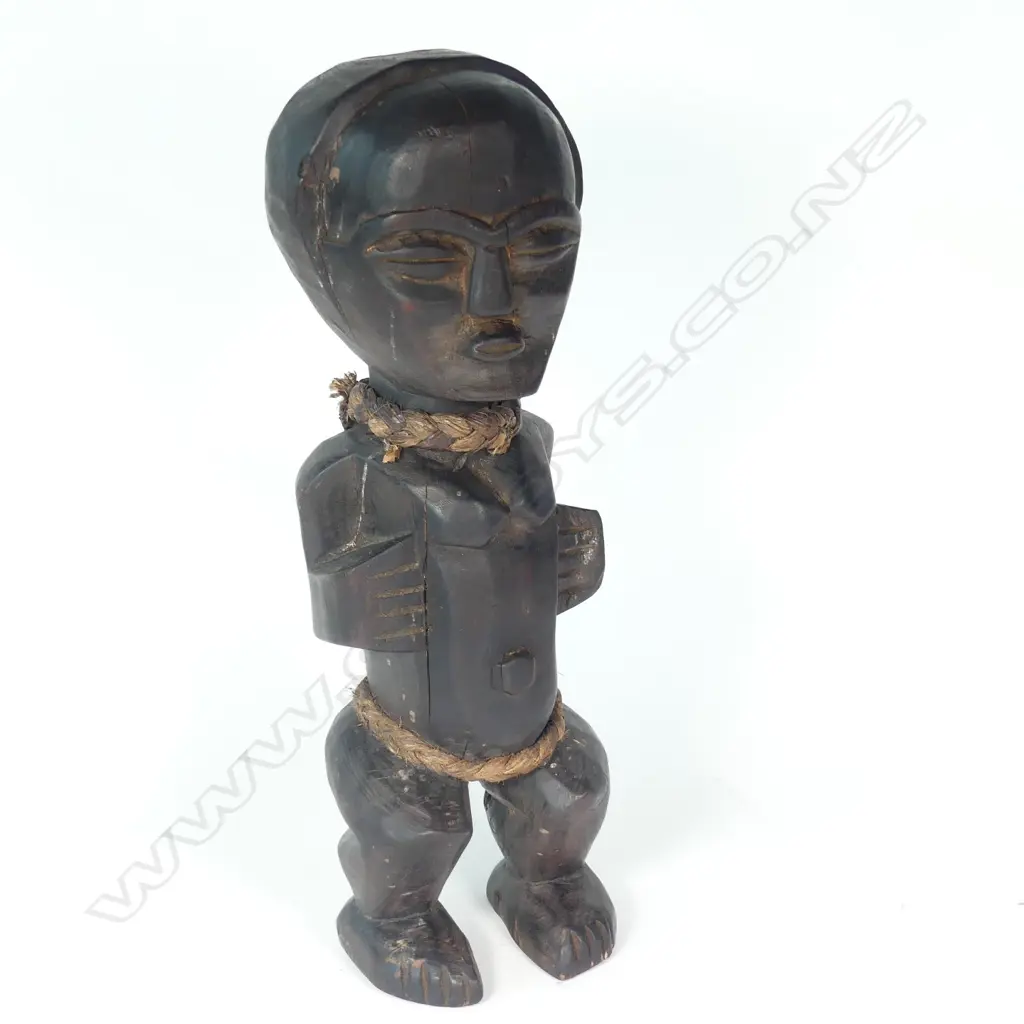 A vintage 'Dan' ancestor figure from Liberia Image 1++