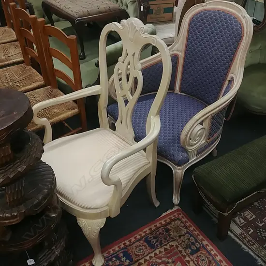 TWO CREAM COLOURED WOODEN ARMCHAIRS