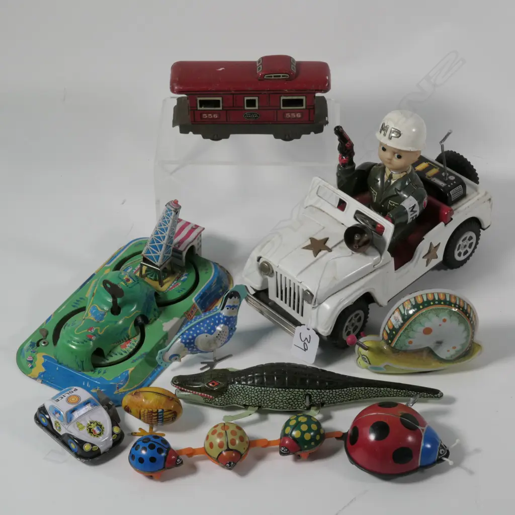 9 VINTAGE JAPANESE TINPLATE TOYS.... Image 1++