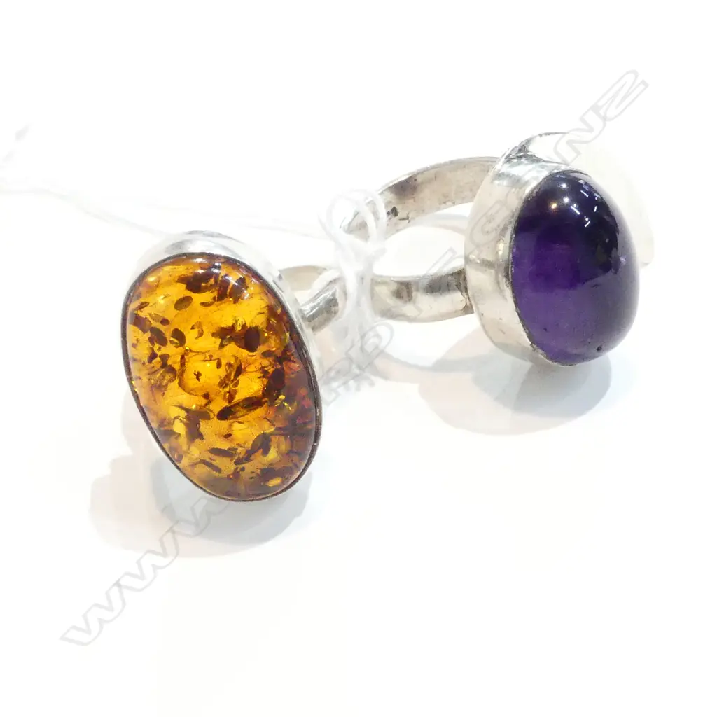 TWO SILVER RINGS AMETHYST AND AMBER SET Image 1++