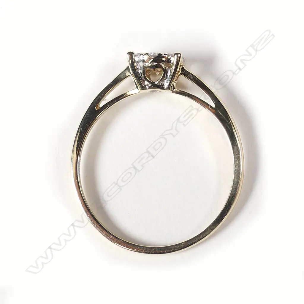 A 9ct gold and diamond ring Image 1++
