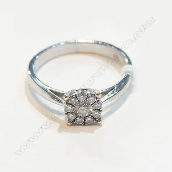 18CT AND 9CT WHITE GOLD DIAMOND CLUSTER RING