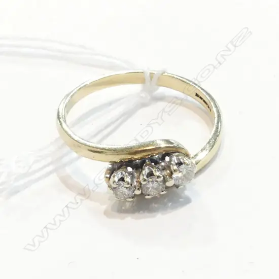 9CT GOLD AND THREE STONE DIAMOND RING