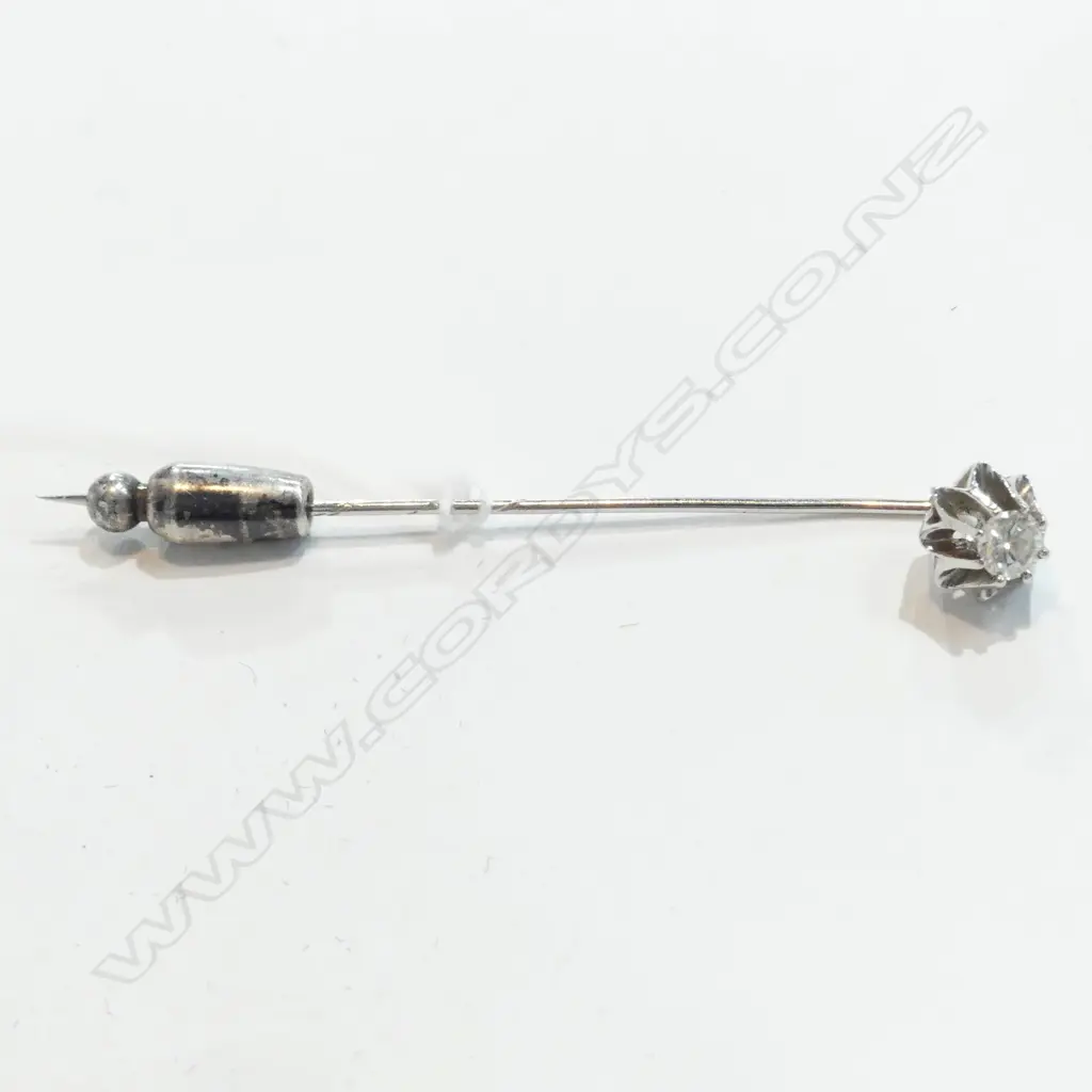 UNMARKED 18CT GOLD AND DIAMOND STICK PIN Image 1++