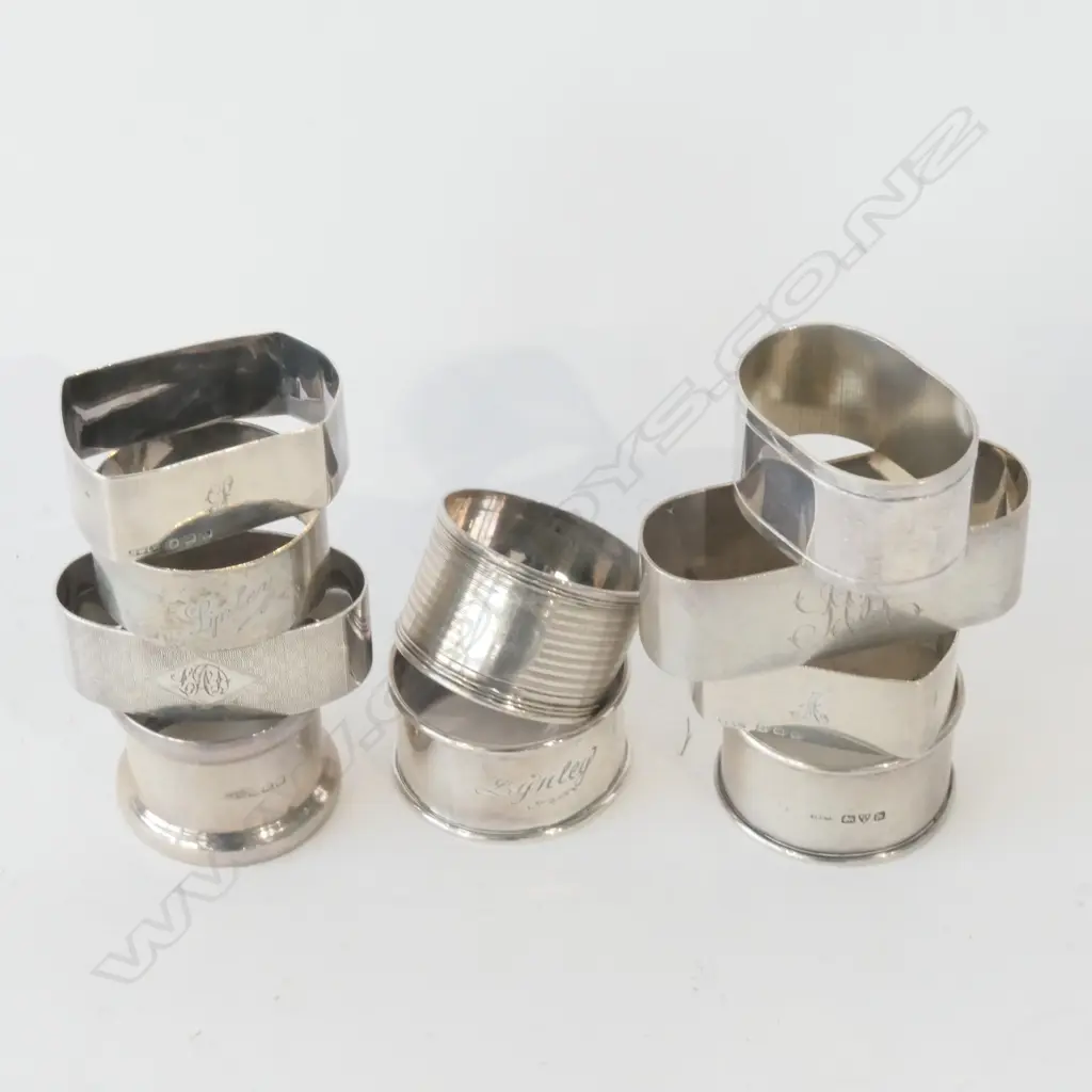 EIGHT SILVER NAPKIN RINGS 156GM & TWO EP Image 1++