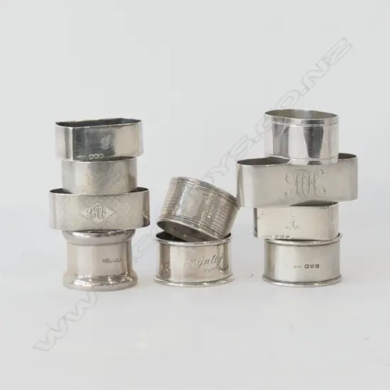 EIGHT SILVER NAPKIN RINGS 156GM & TWO EP