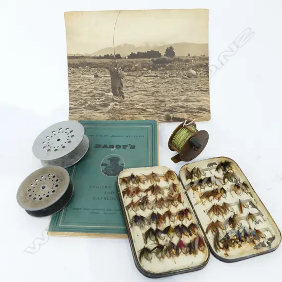 2 1/4'' BRASS 'ALLCOCKS' CENTRE PIN REEL, ANGLERS GUIDE, FLY TIN, TWO SPOOLS AND PHOTO