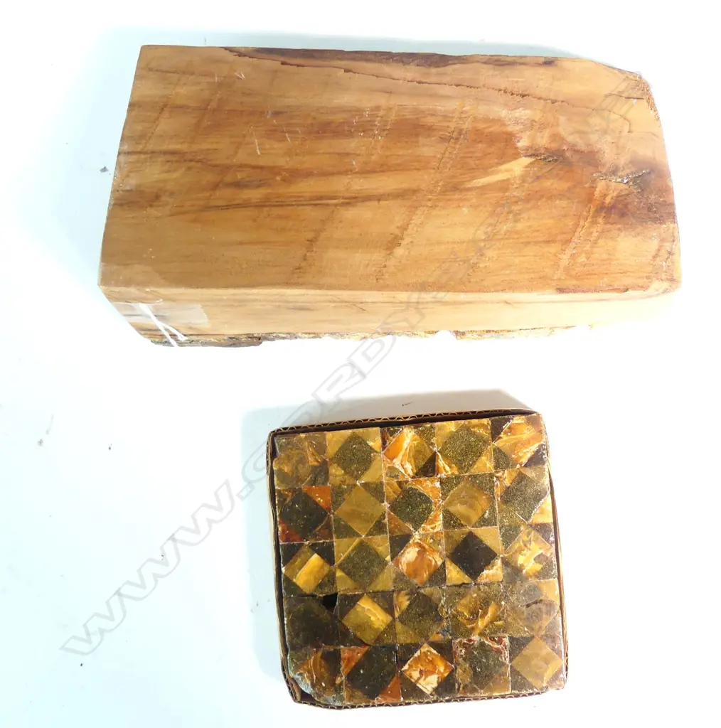 A kauri gum tile assembled out of cut and geometric pieces of gum Image 1++