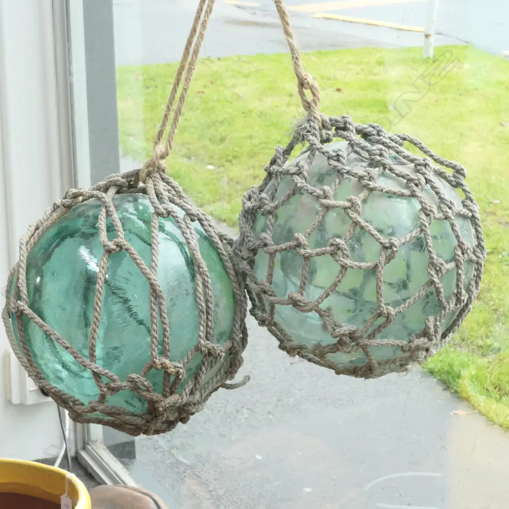 2 OLD GLASS FISHING FLOATS WITH NETTING... Image 1++