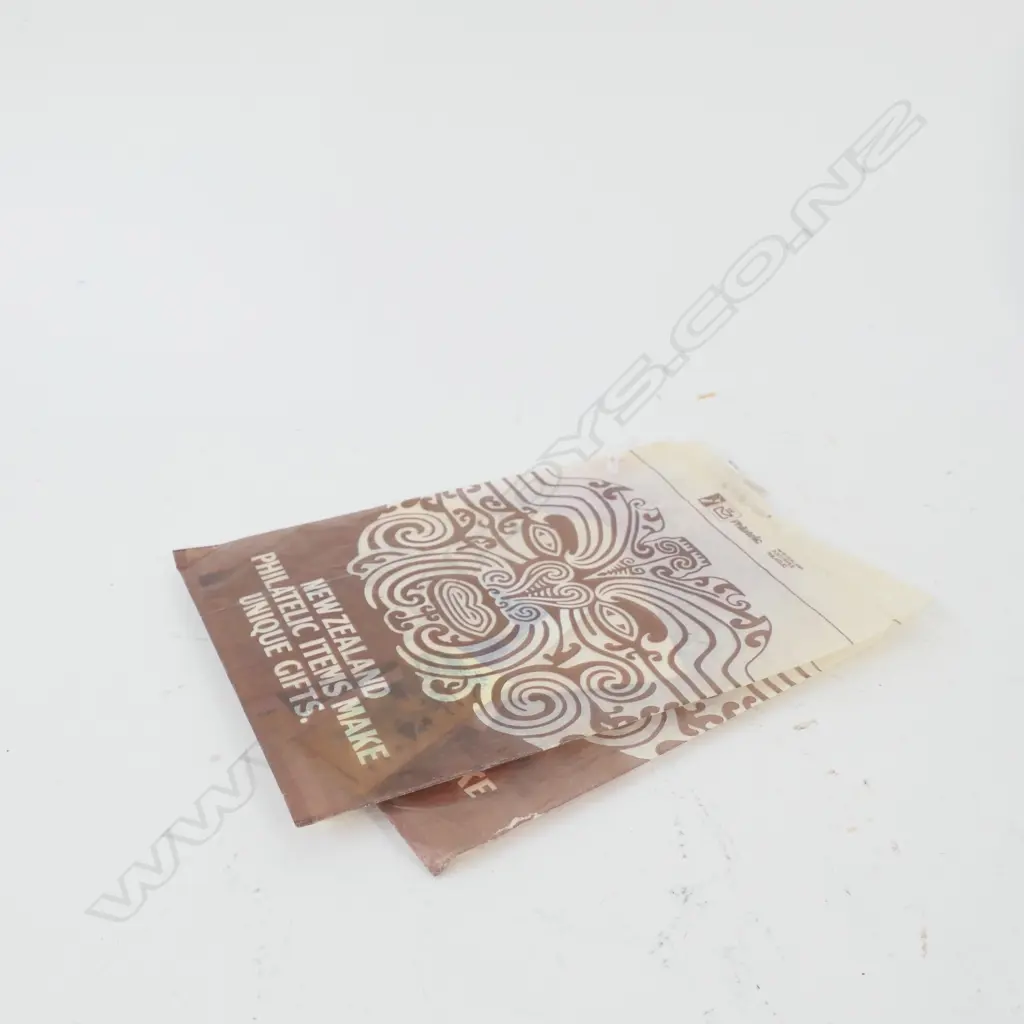 TWO PACKETS OF NZ STAMPS Image 1++