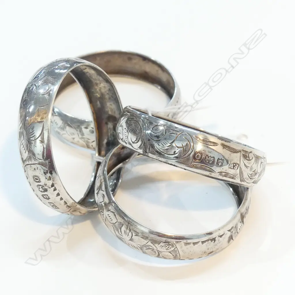 4 STG NAPKIN RINGS Image 1++
