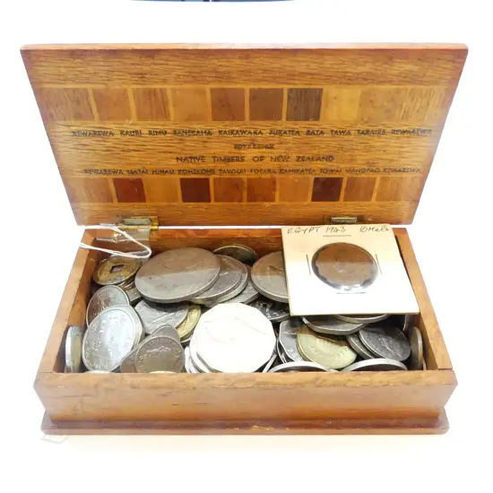 N.Z NATIVE WOODS BOX WITH ASST WORLD COINS