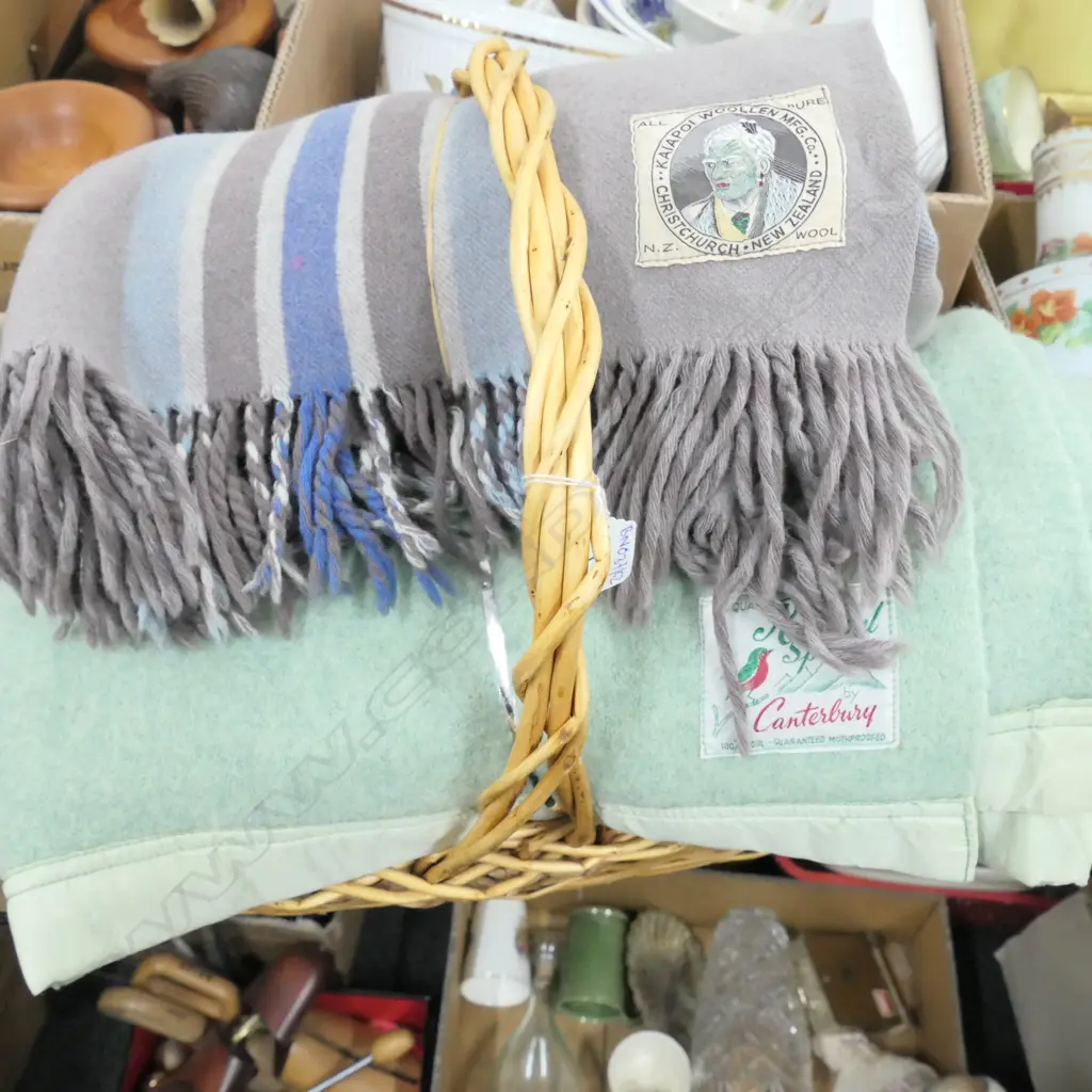 TWO GOOD WOOLLEN BLANKETS; RARE KAIAPOI MILLS MAORI CHIEF LABEL AND CANTERBURY ROBINWUL INCL. BASKET Image 1++