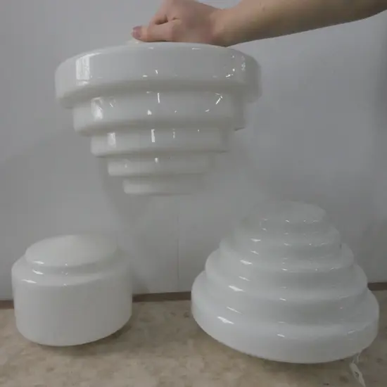 PAIR OF ART DECO MILK GLASS STEPPED SHADES AND ONE OTHER