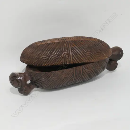 A LATE 20TH C CARVED WAKA HUIA L 350 MM