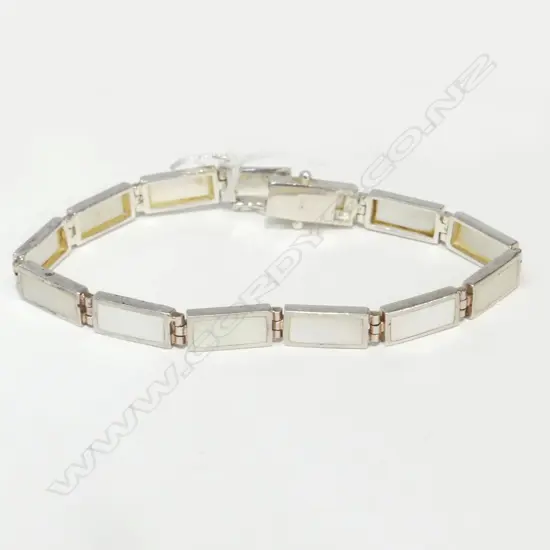 SILVER AND M.O.P BRACLET