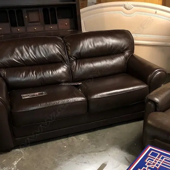BROWN LEATHER TWO SEATER SOFA