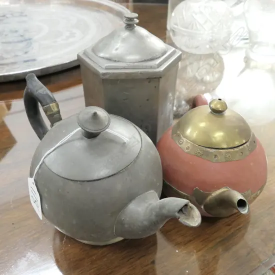 TWO TEAPOTS AND A PEWTER TEA CADDY