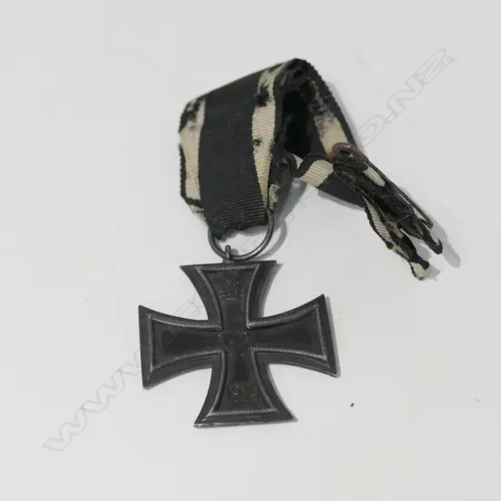 GERMAN WWI IRON CROSS (MAGNETIC), ON ORIGINAL RIBBON