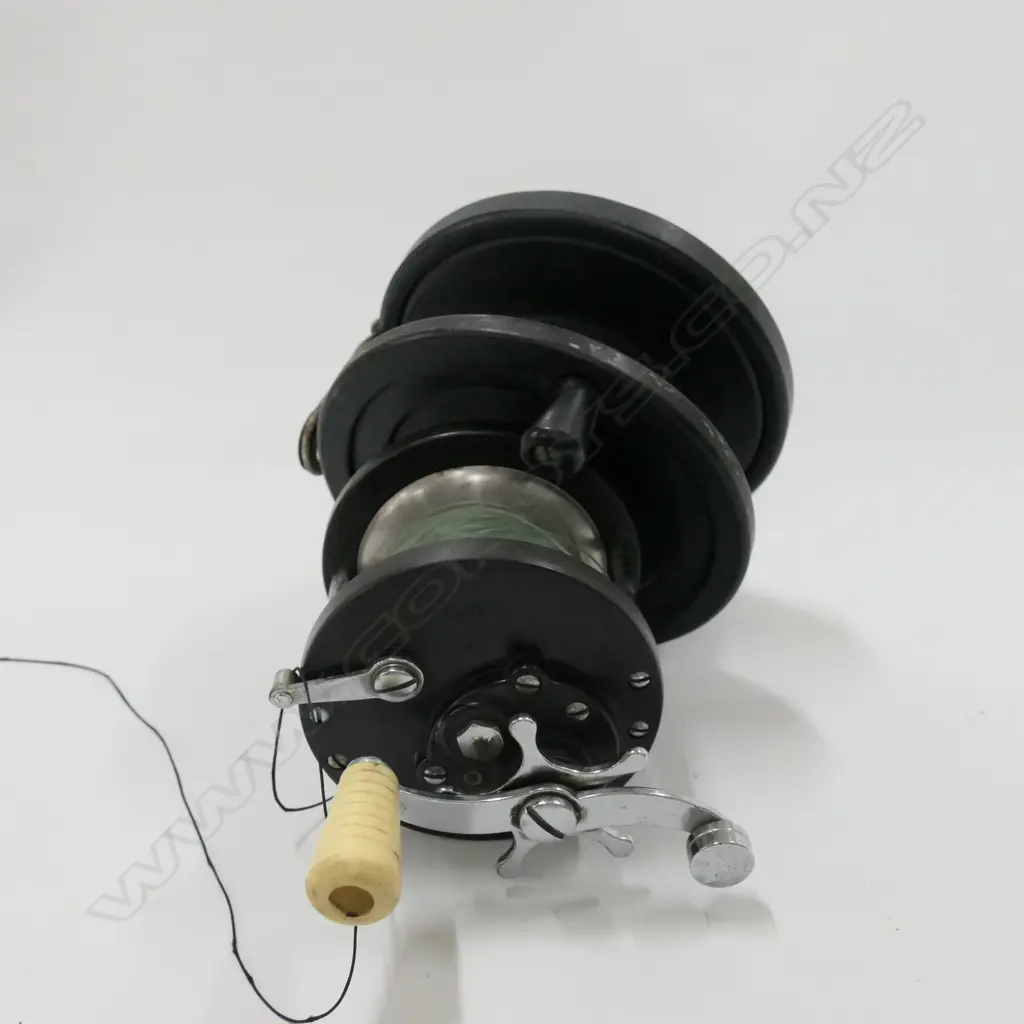 TWO FISHING REELS Image 1++